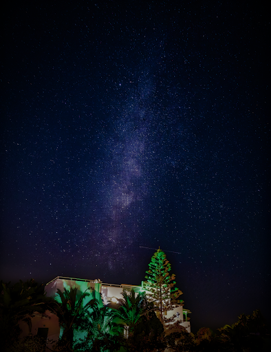 Studios Vrettos beachfront hotel by night