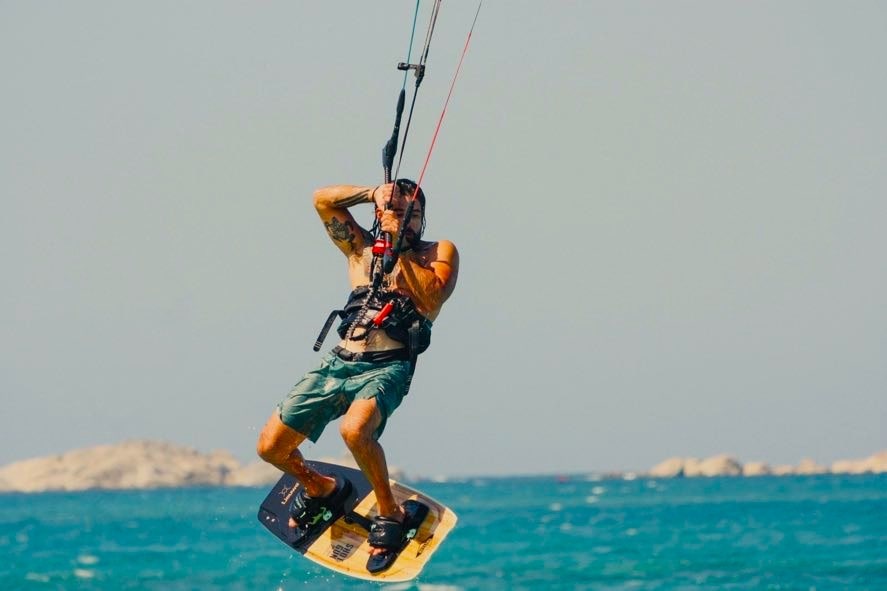 Jumping around Plaka Beach