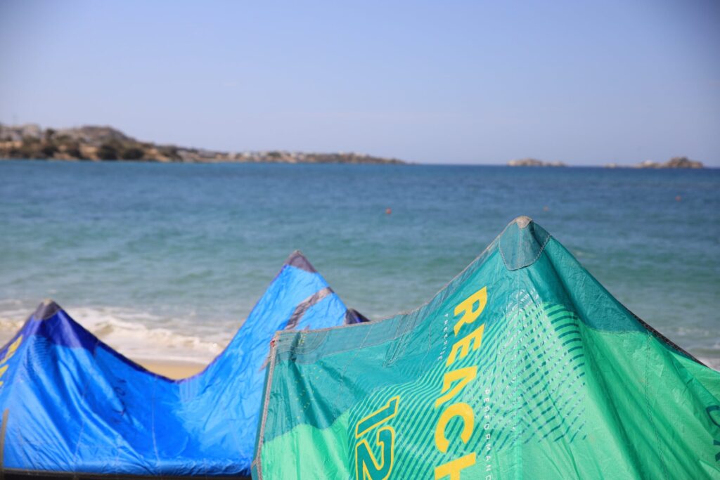 Kites are on the beach waiting someone to rent them