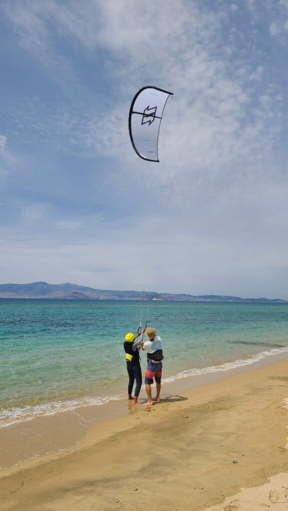 Learning kite control at the beach.