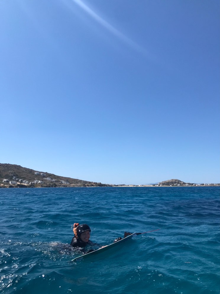 Happy student inside the water.